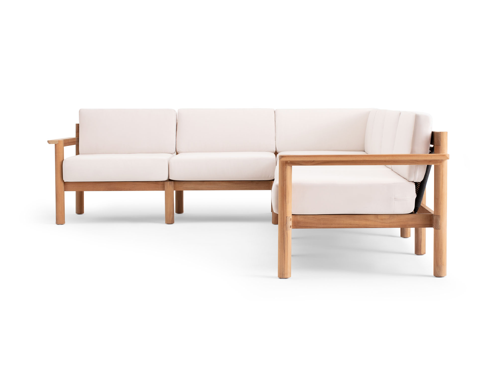 Side view of 6-piece outdoor sectional with white cushions